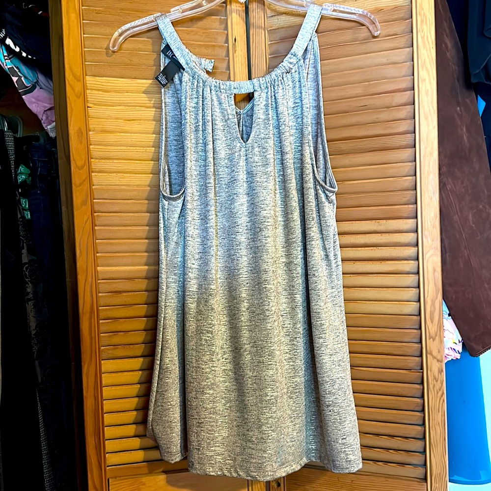Woman’s gorgeous sparkly tank top